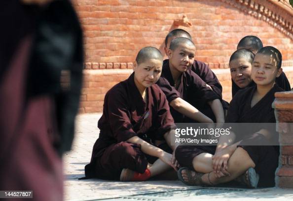 Buddhist nuns practise Kung-fu at the Amitabha Drukpa Nunnery on the outskirts of Kathmandu on April 26, 2012. The sisters of the Amitabha Drukpa Nunnery -- aged from nine to 52 -- come from across Nepal, India, Tibet and Bhutan to learn the ancient Chinese discipline of kung fu, which they believe will help them be better Buddhists. Buddhist nuns in the Himalayas have traditionally been seen as inferior to monks, with the women kept away from physically demanding exercise and relegated to menial tasks like cooking and cleaning. But the 800-year-old Drukpa -- or dragon -- sect is changing all that by mixing meditation with martial arts as a means of empowering its women. AFP PHOTO / PRAKASH MATHEMA (Photo credit should read PRAKASH MATHEMA/AFP/GettyImages)